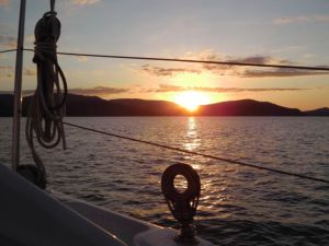 Sunset from deck of Two Up Together Airlie Beach Race Week 